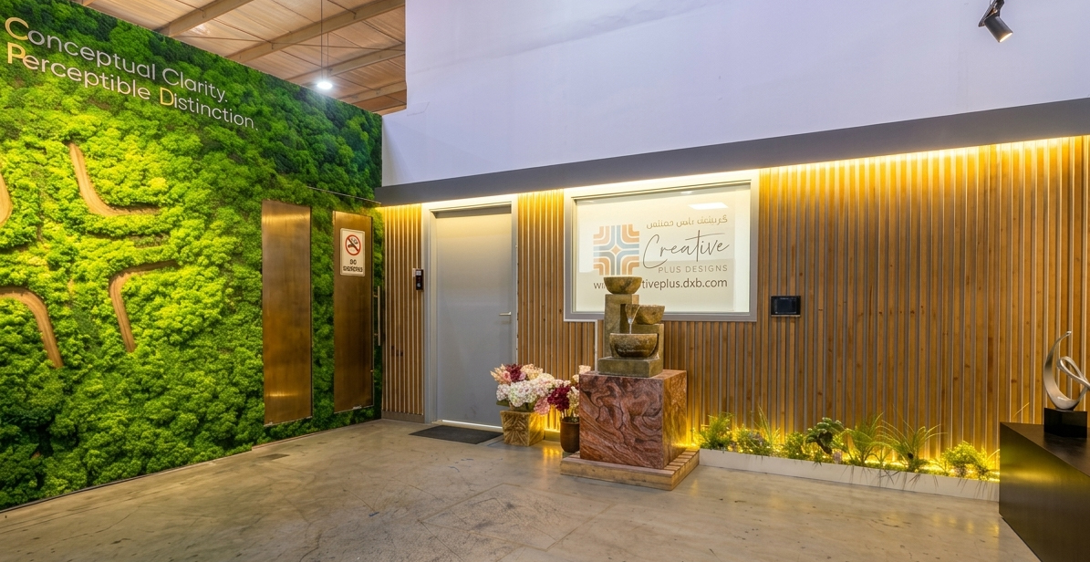 The Creative Plus Designs reception, with the moss wall and the timber screen